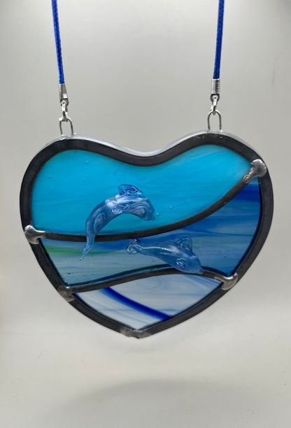 Dancing dolphins glass heart