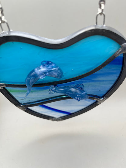 Dancing dolphins glass heart